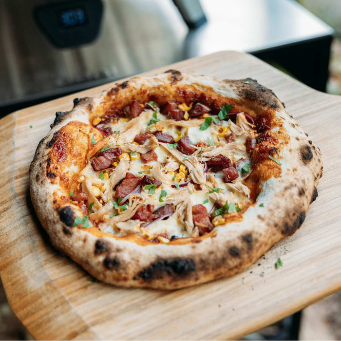 BBQ Chicken, Corn, Onion, Bacon and Cilantro Pizza