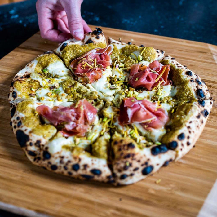 “The Marco” Pizza with Pistachio Cream, Mozzarella, Pecorino and Prosciutto Crudo