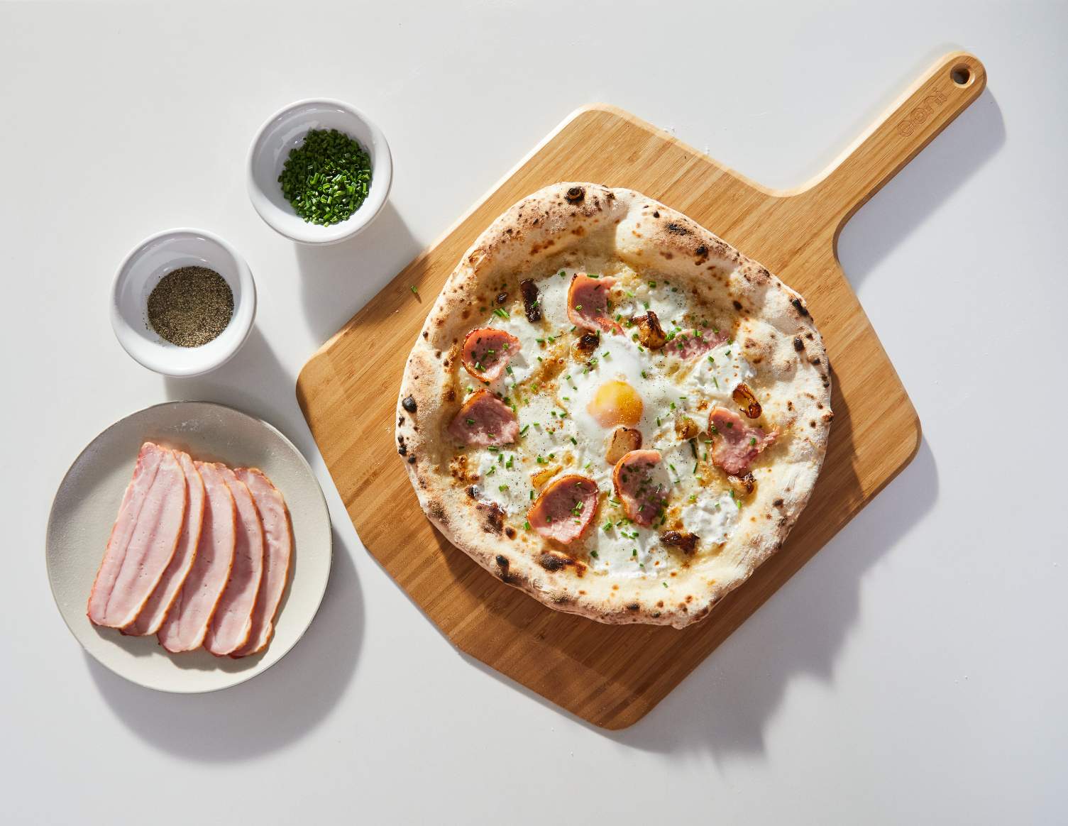 Egg, Onion and Canadian Bacon Brunch Pizza — Ooni Canada