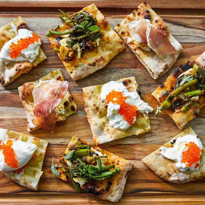 Pizza Crostini with Ricotta and Marinated Broccolini