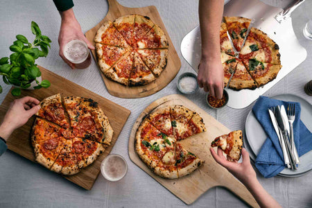 How to Bake Pizza for a Crowd: Tips for Cooking Multiple Pizzas and Recovering from Epic Fails