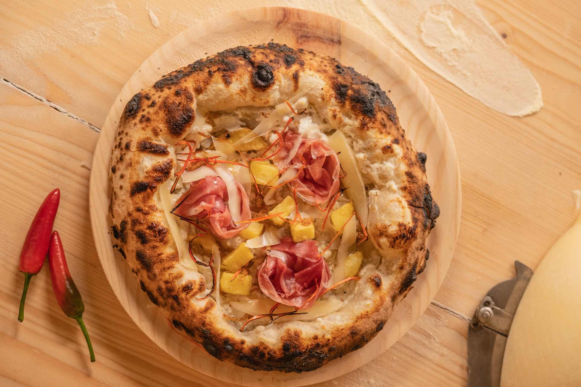 Calabrese Delight: Ricotta, Ham, Potato, Onion and Spicy Chili Pepper Pizza Recipe — Ooni Canada