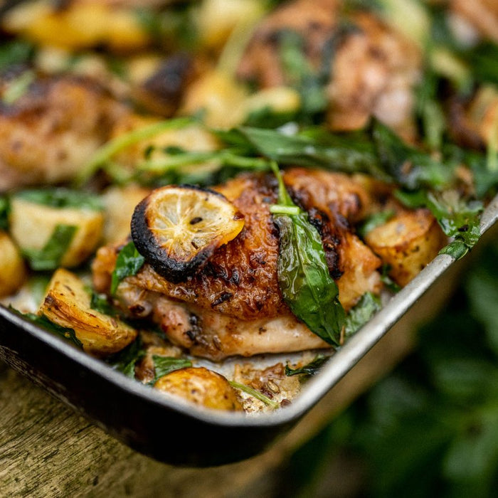 Gill Meller’s Baked Chicken Thighs with New Potatoes, Wild Garlic and Lemon