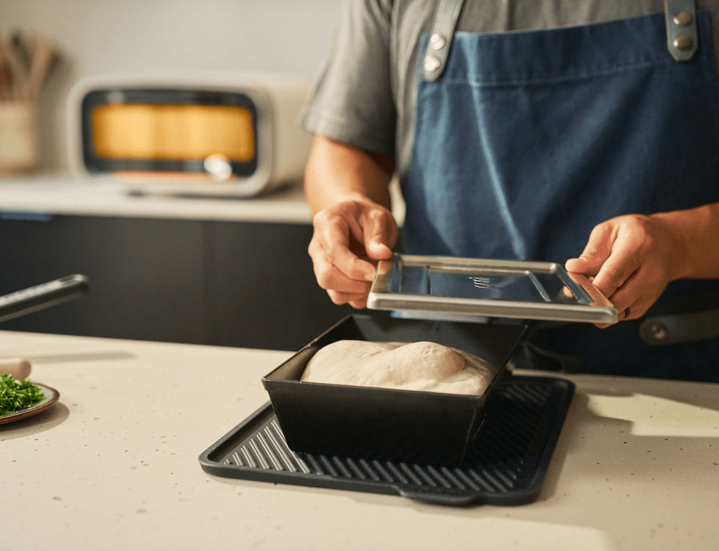 dough proofing in detroit style pizza pan