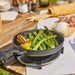 Cast Iron Skillet pan with cooked asparagus 