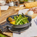 Skillet pan with asparagus and lemon