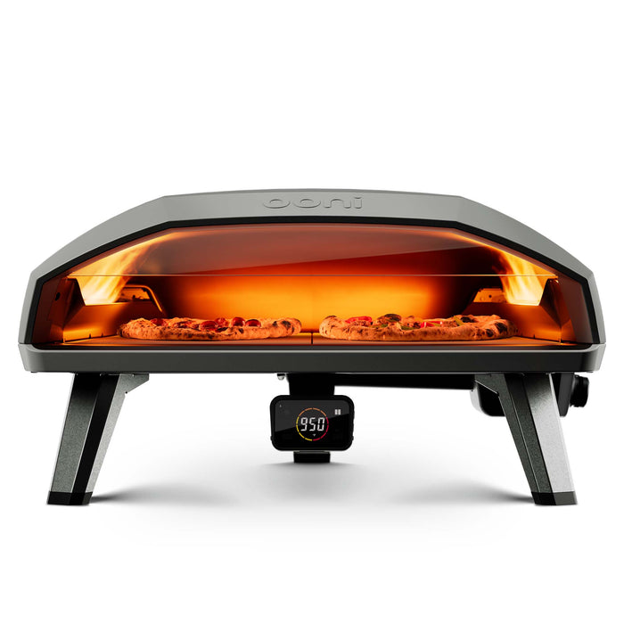 Ooni Koda 2 Max outdoor pizza oven viewed face on, baking two pizzas. | Click this image to open up the product gallery modal. The product gallery modal allows the images to be zoomed in on.