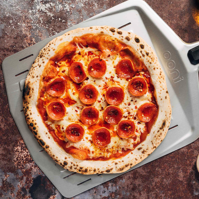 Ooni 12″ Perforated Pizza Peel | Cliquez sur cette image pour ouvrir la fenêtre modale de produits. La fenêtre modale de produits permet de zoomer sur les images.