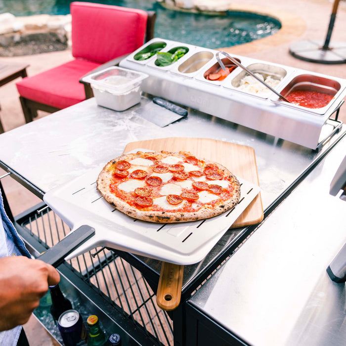 Ooni 12″ Perforated Pizza Peel | Click this image to open up the product gallery modal. The product gallery modal allows the images to be zoomed in on.