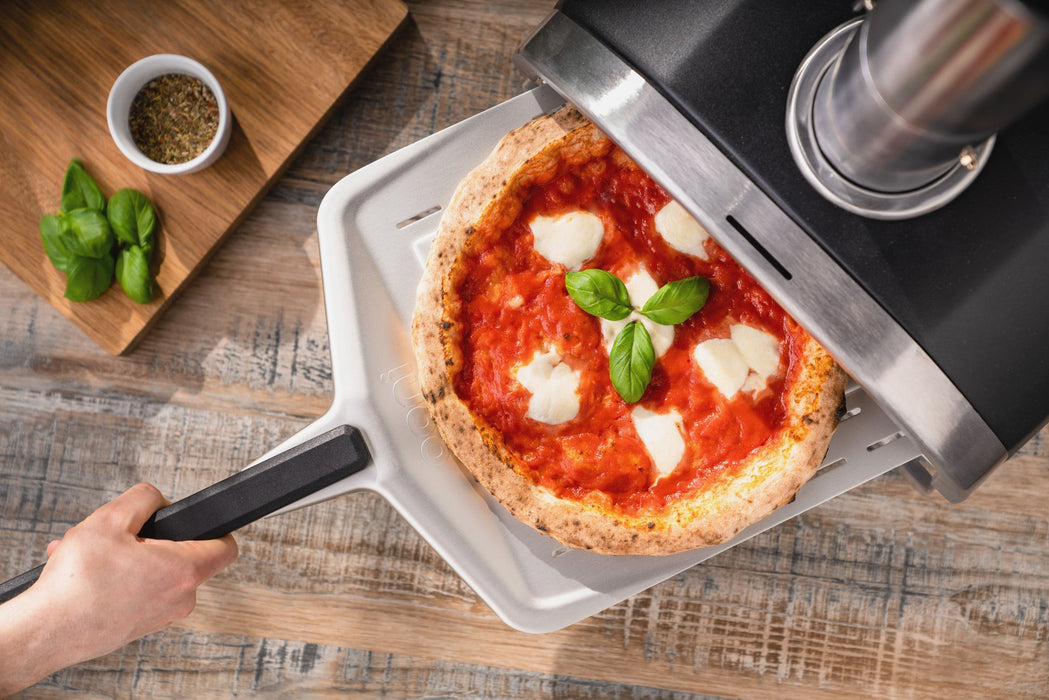 Ooni Fyra 12 Wood Pellet Pizza Oven - Ooni Canada | Click this image to open up the product gallery modal. The product gallery modal allows the images to be zoomed in on.